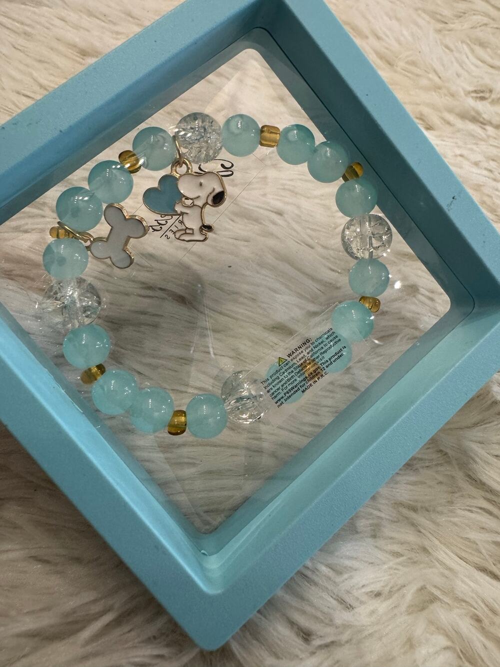 Snoopy blue and gold beaded bracelet clear and light blue beads snoopy charm